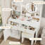 Meuble-lavabo blanc avec miroir et lumières