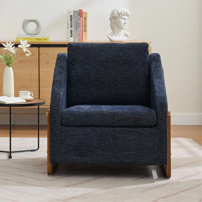 Fauteuil chenille en tissu bleu avec rembourrage en mousse et structure latérale en bois pour les espaces de chambre