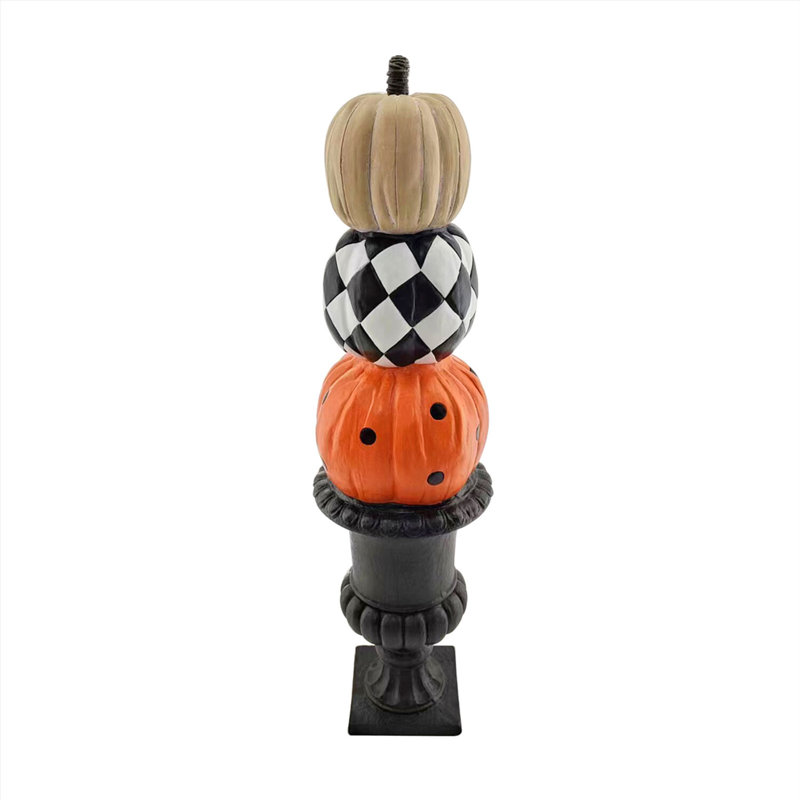 52-inch Stacked Orange, Beige, and Black Metal Pumpkins in Urn