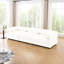Luxueux canapé en chenille avec siège de rangement et éléments cylindriques pour un moment de détente