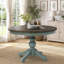 Table de salle à manger ronde à deux tons avec pieds sculptés-518520899