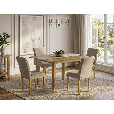 Cet ensemble de salle à manger 5 pièces comprend une table de salle à manger rectangulaire avec feuille papillon et 4 chaises rembourrées en tissu brun clair en lin, chêne