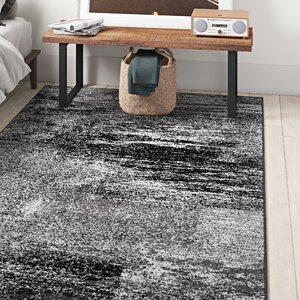 https://assets.wfcdn.com/im/07668913/resize-h300-w300%5Ecompr-r85/9250/92500538/Gicelle+Abstract+Silver%2FBlack+Area+Rug.jpg