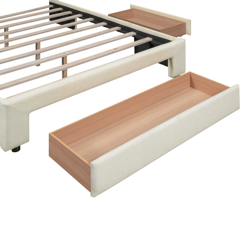 Lit plateforme tapissier double avec un grand tiroir dans le pied de lit et un tiroir de chaque côté, beige