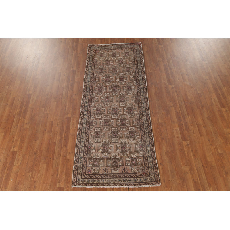 Tapis à motif géométrique 3x9