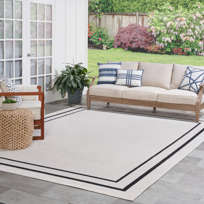 Arvell Abstract Machine Woven Chenille Indoor/Outdoor Area Rug in Ivory Black