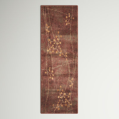 Tapis brun à motif floral Arnim