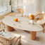 Table de salle à manger 86 "en forme d'œuf en pierre avec base à trois pieds en bois massif, plateau en travertin pour 6 sièges, table de cuisine moderne de forme ovale