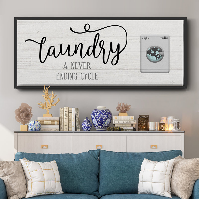 " Never Ending Laundry ", 25" H x 45" W x 1" D, Black Framed Canvas