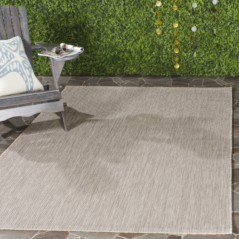 Mccullough Solid Colour Hand Woven Indoor / Outdoor Area Rug, Rectangle 122 x 170 cm