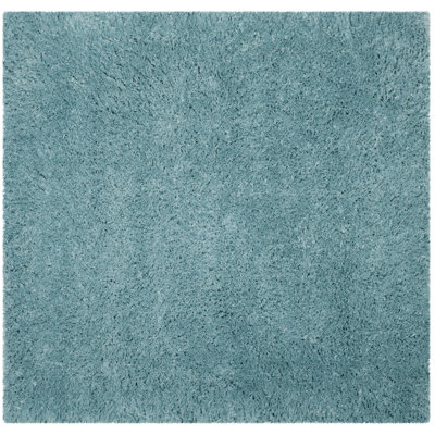 Hermina Light Turquoise Area Rug