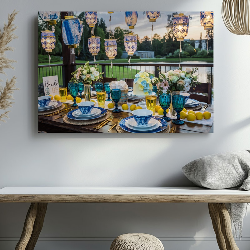 Toile une scène de douche nuptiale vibrante avec un tableau d'art mural bleu et des lanternes blanches à motif flottant au-dessus d'une magnifique toile murale