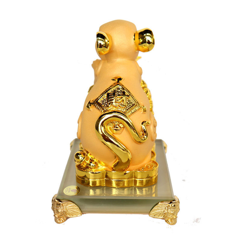 Figurine de rat chinois avec ananas