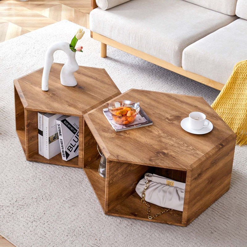 Ensemble de tables basses hexagonales à motifs minimalistes. Table basse hexagonale en panneau de fibres à densité moyenne, autocollants à motifs caractéristiques, conception à plusieurs trous pour donner plus d'espace de rangement. Deux tables bass