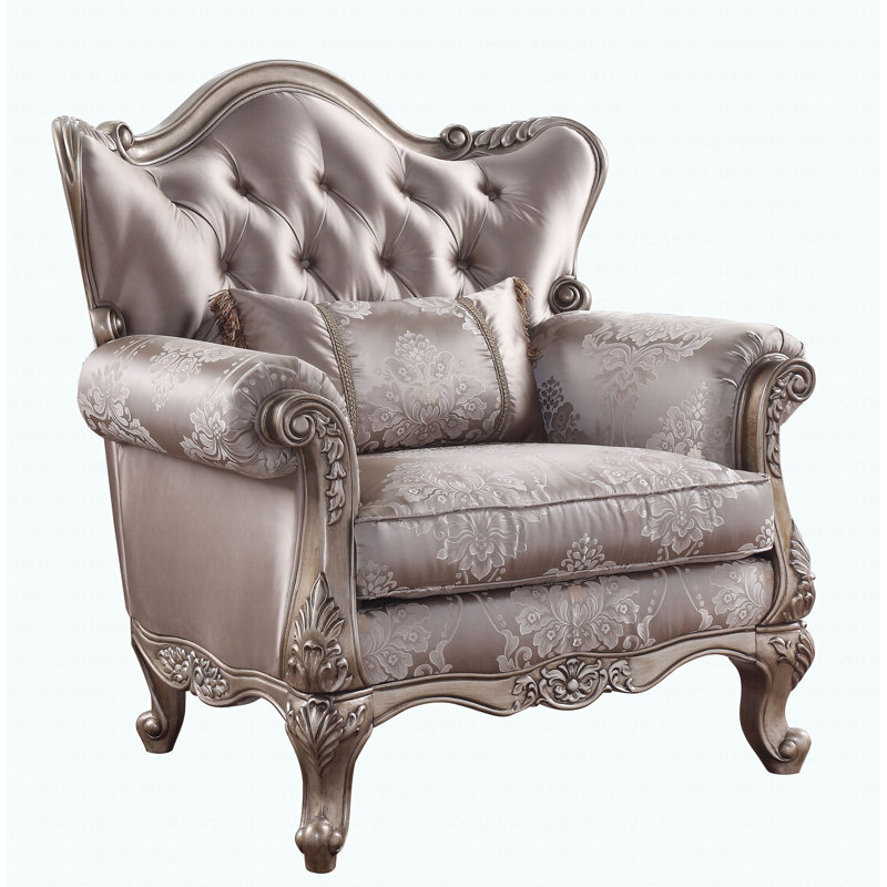 Chaise moderne en tissu et finition champagne avec coussin