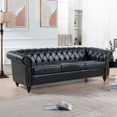 PU Rolled Arm Chesterfield Three Seater Sofa.