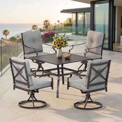 4-Person Steel Patio Dining Set With Textilene Sling Swivel Chairs And Cushions