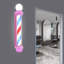 Enseigne lumineuse rotative pour salon de coiffure-114624689