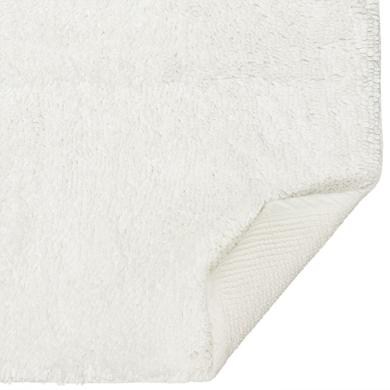 Dinuba Solid Plush Pile Stain and Fade Resistant Non-Slip Machine Washable Bath Rug, White, 17" W x 24" L