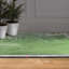 Tapis rectangulaire Divyan avec envers antidérapant