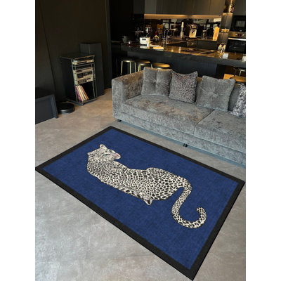 Tapis tissé bleu marine à motif léopard