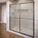 Deluxe 52'' - 54'' W x 71.5'' H Bypass Framed Shower Door with Pattern Glass