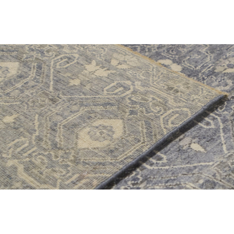 Tapis bleu de haute qualité noué à la main