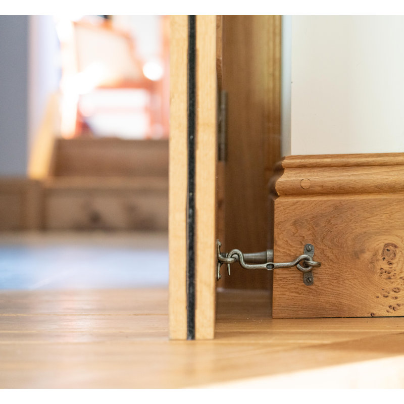 Projection Steel Baseboard Door Stop, Pewter Patina