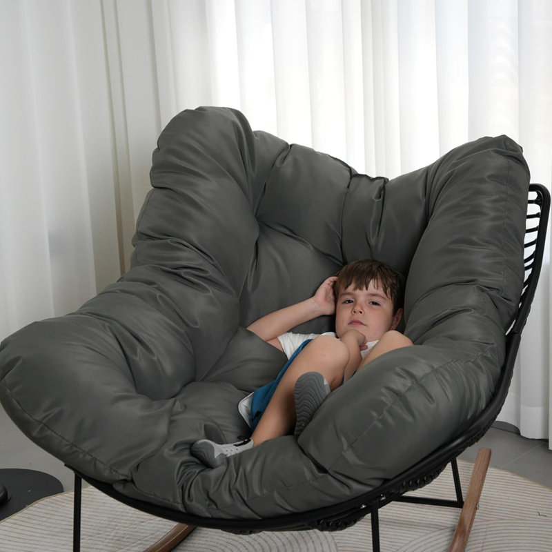 Chaise berçante intérieure / extérieure avec tissage en rotin et structure en acier, Gris, Noir / brun