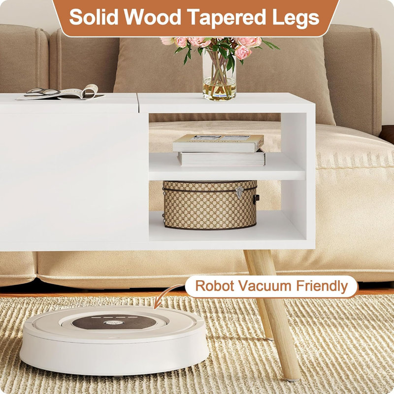 Table basse avec pieds en bois massif, compartiment de rangement caché et tablettes ouvertes