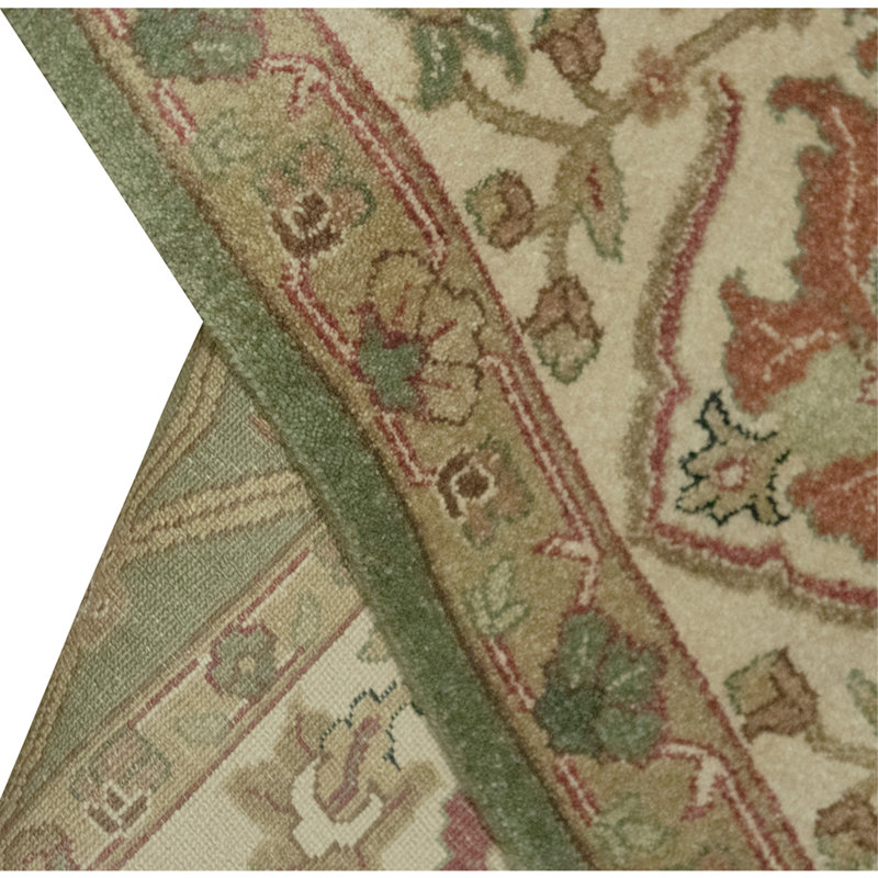 Hand Knotted Wool Oriental Area Rug in Green And Ivory