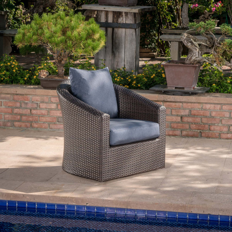 CHAISE CLUB PIVOTANTE DARIUS, Coussin bleu / cadre brun foncé