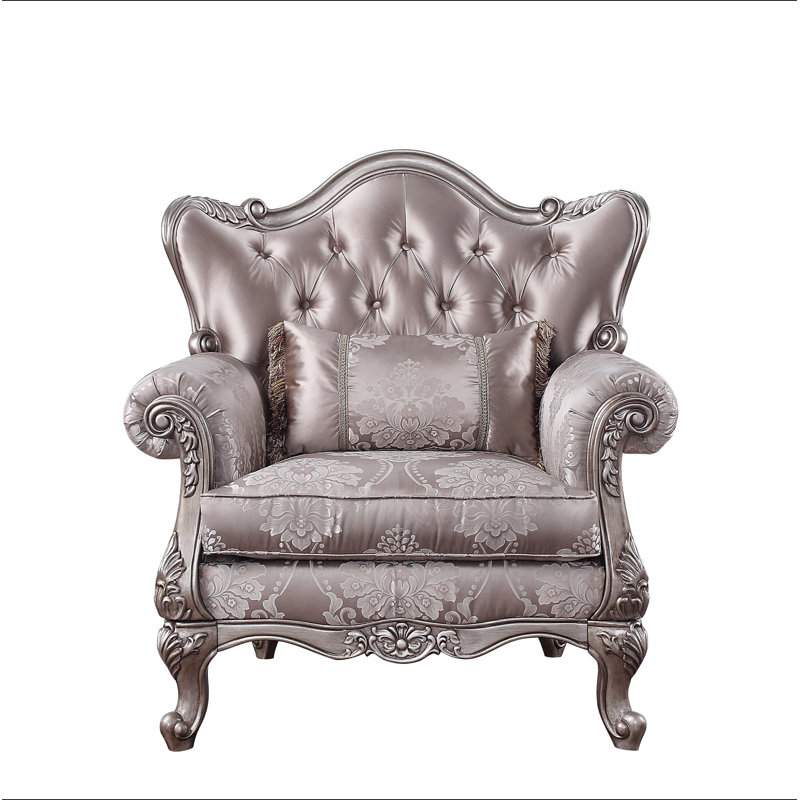 Chaise en tissu et champagne avec coussin