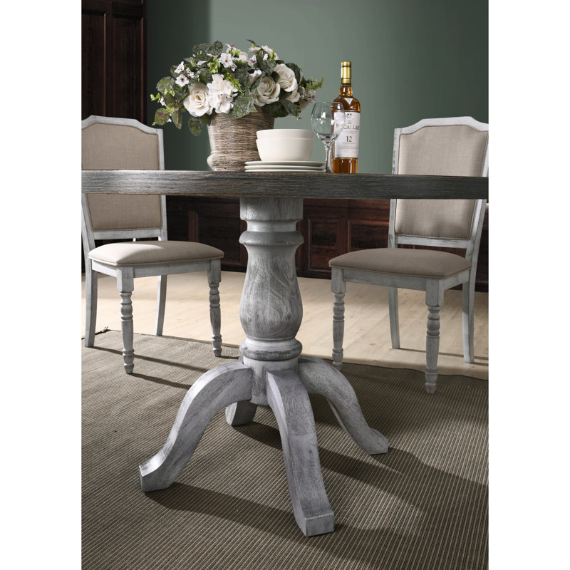 Iris Round Pedestal Wood Dining Table