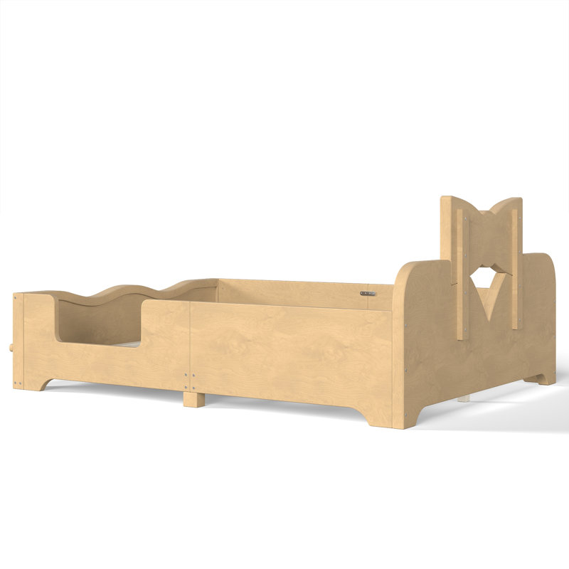 Lit plateforme pour enfants avec tête de lit à nœud papillon, barrières de sécurité intégrales et tablette latérale intégrée.