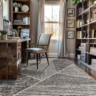Tapis contemporain délavé à motif géométrique
