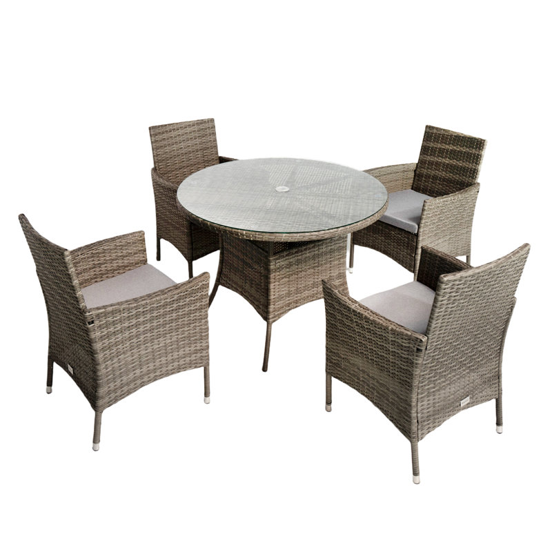 Twigg 4 - Person Premium All-Weather Wicker Patio Dining Set with Round Table , Cushions Included