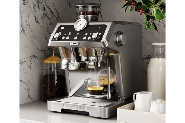 semi-automatic espresso maker with a freshly-brewed cup of espresso in a glass mug on a kitchen countertop