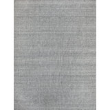 Paani Hand Loomed Area Rug in Natural Black