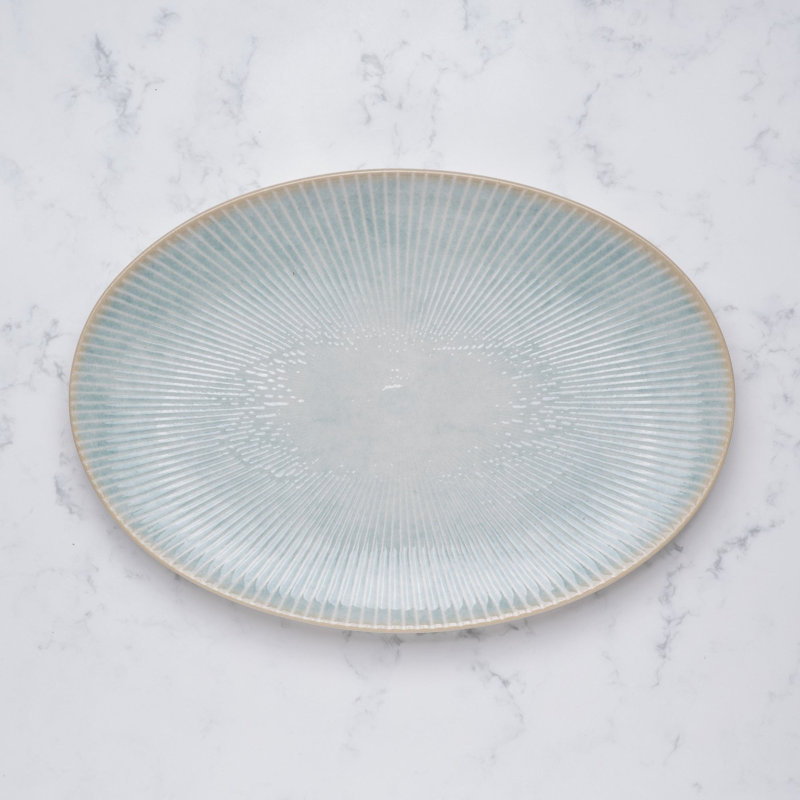 Assiette ovale en porcelaine titane de qualité supérieure Paros-Aqua avec pied, 32 x 22 cm, Turquoise
