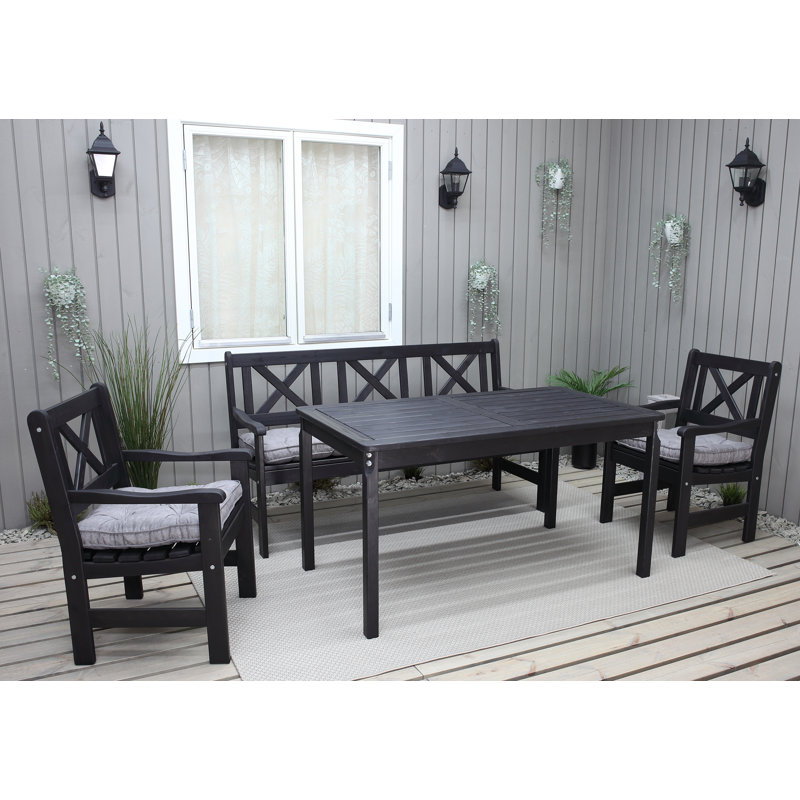 Destry 5 - Person Wood Patio Dining Set with Rectangular Table , Cushions Included, Black