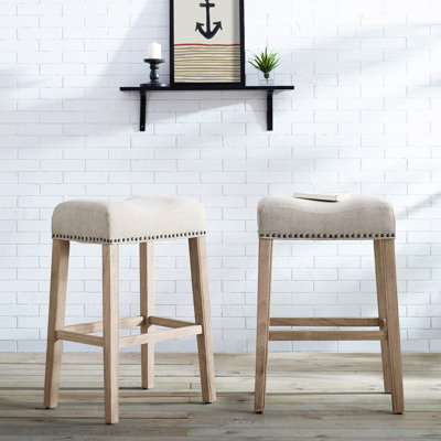 29" Tan Bar Stools With Saddle Seat, Of 2. Crafted From Genuine Wood Weathered Finish. Upholstered. Modern Design. 18"W X 13"D 29"H. Some Assembly. For Home Use Backless Seat In Upholstery 2 - Real
