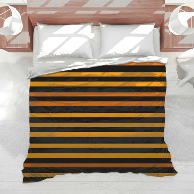 Édredon noir à rayures noires et orange