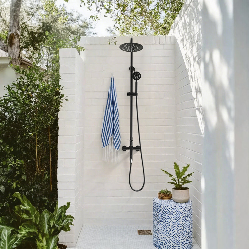 47" H Wall Mounted Stainless Steel Adjustable Height Outdoor Shower with Footwash Spout, Matte Black
