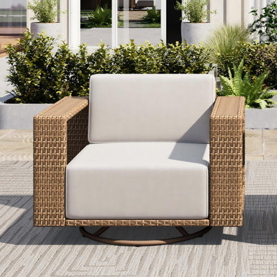 Chaise pivotante en osier avec accoudoirs