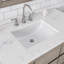 Meuble-lavabo de comptoir en marbre blanc Carrara de 48 po Oakman avec robinet chromé Oakman