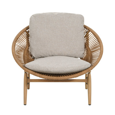 Chaise longue en osier de style papasan Cyril - Brun clair, siège de patio en rotin avec coussin beige, mobilier d'extérieur Boho résistant aux intempéries