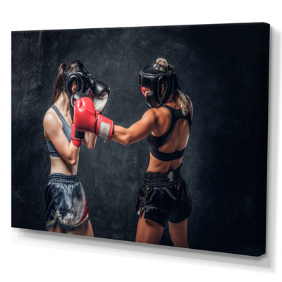 " Two Female Boxers Fighting "
