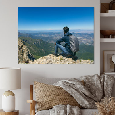 " Young Man Hiking Mountain "