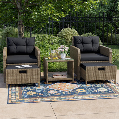 Radostin 5- Piece Rattan Patio Seating Group with Ottomans